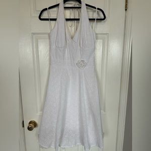 White halter dress with lace detail at waist